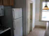 Blair St downstairs kitchen new appliances & chandelier.JPG (72386 bytes)